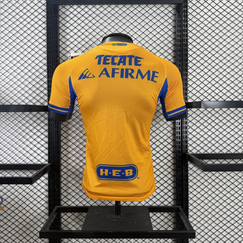 Player Version 25/26 Tigres UANL Gold with Blue Chest Band, 65th Anniversary Badge & Sportiumbet Jersey
